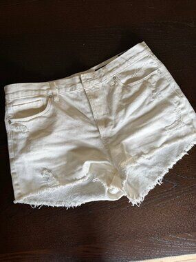 White distressed jean shorts